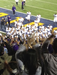 NU players greet their fans after the win.