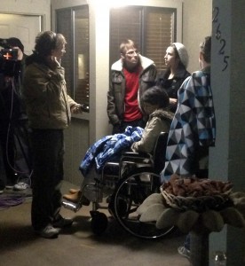 Christina Rose asks a question of Director Chris Redish (left) while actor Charles Baker listens.